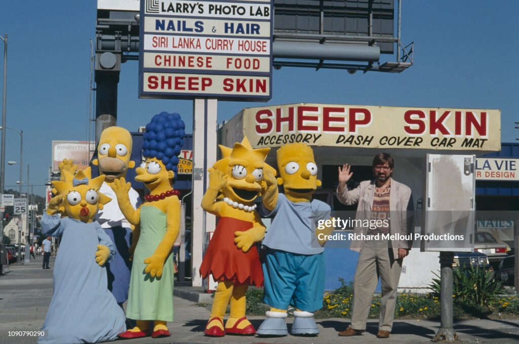 Matt Groening with the Simpsons American Cartoonist Matt Groening poses with characters from his animated TV series "The Simpsons", November 1990. (Photo by Richard Melloul/Sygma/CORBIS/Sygma via Getty Images)