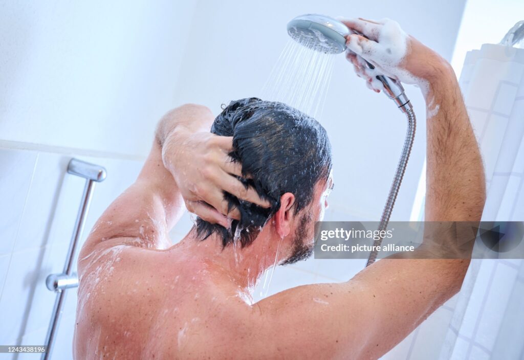 A man showering.