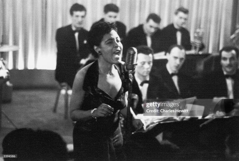 Billie Holiday American jazz icon singer Billie Holiday (1915 - 1959), also known as 'Lady Day', during a performance, 1954. Picture Post - 7380 - Billie Holiday - unpub. (Photo by Charles Hewitt/Picture Post/Hulton Archive/Getty Images)