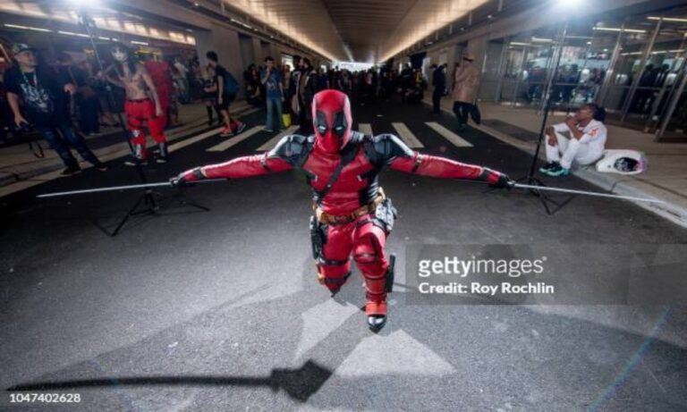 Fan cosplaying as Deadpool 2018 NY Comic-Con No Avengers 5)