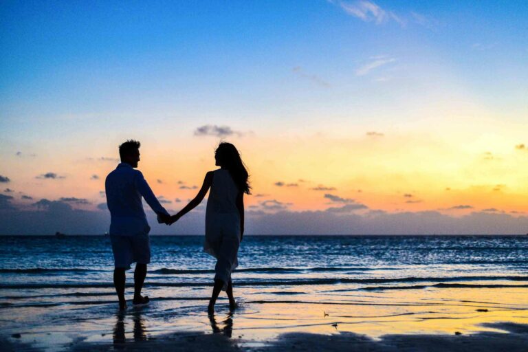 horoscope Photo by Asad Photo Maldives: https://www.pexels.com/photo/man-and-woman-holding-hands-walking-on-seashore-during-sunrise-1024960/