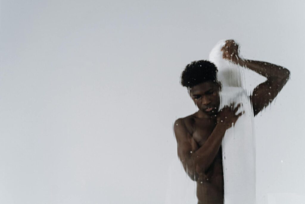 Photo by cottonbro studio: https://www.pexels.com/photo/shirtless-man-putting-towel-on-his-shoulder-8298498/