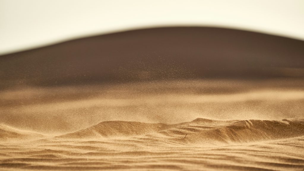 Sand. Image courtesy of Unsplash.com. https://unsplash.com/photos/brown-sand-in-closeup-photography-ANICl9V7BUA