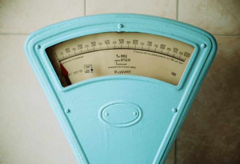 Scale. This is the featured image for the article on Kelly Clarkson's weight loss. Image courtesy of Unsplash.com. https://unsplash.com/photos/a-close-up-of-a-meter-on-a-tiled-wall-iLKK0eFTywU
