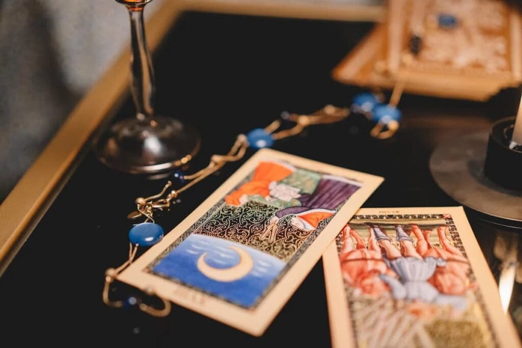 Tarot Cards on a Table for Pisces and The Moon
