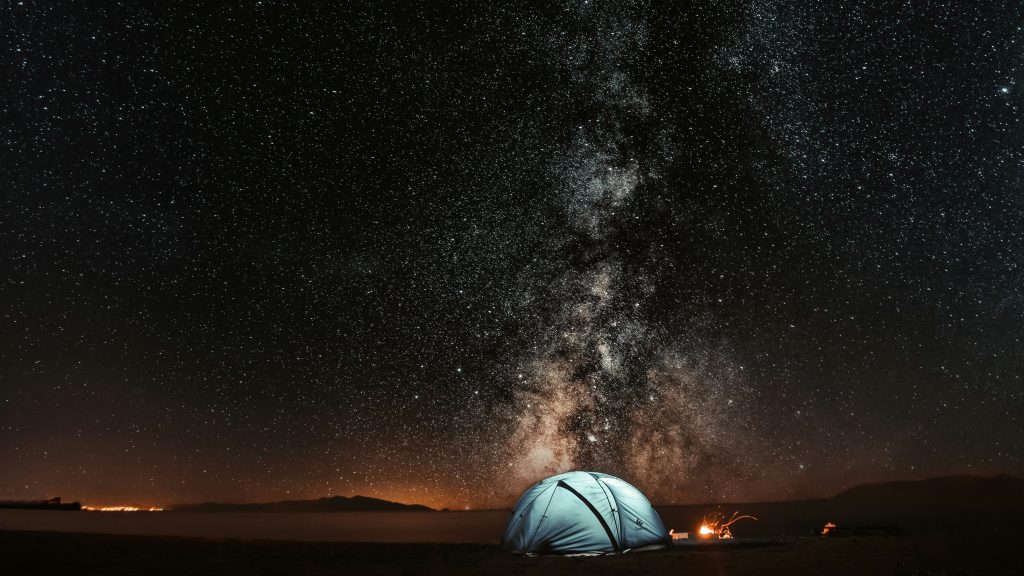 Tent at night. Image courtesy of Unsplash.com. https://unsplash.com/photos/blue-tent-under-milkyway-V7uP-XzqX18
