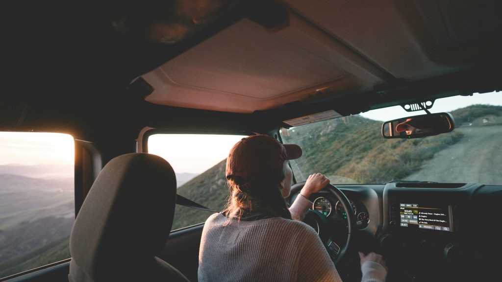 Woman driving. Image courtesy of Unsplash.com. https://unsplash.com/photos/woman-driving-vehicle-on-road-during-daytime-wcT778-M1WE