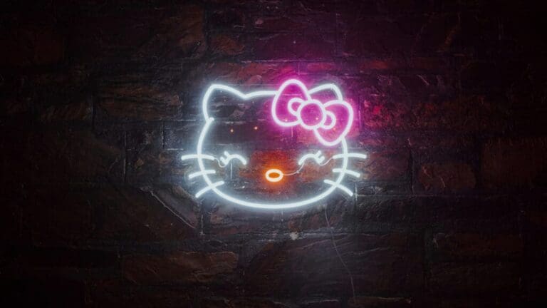 Neon lights displaying the image of Hello Kitty. This is the featured image for the article on Hello Kitty. Image courtesy of Unplash.com. https://unsplash.com/photos/a-neon-hello-kitty-sign-on-a-brick-wall-GAhBHu0GJZg
