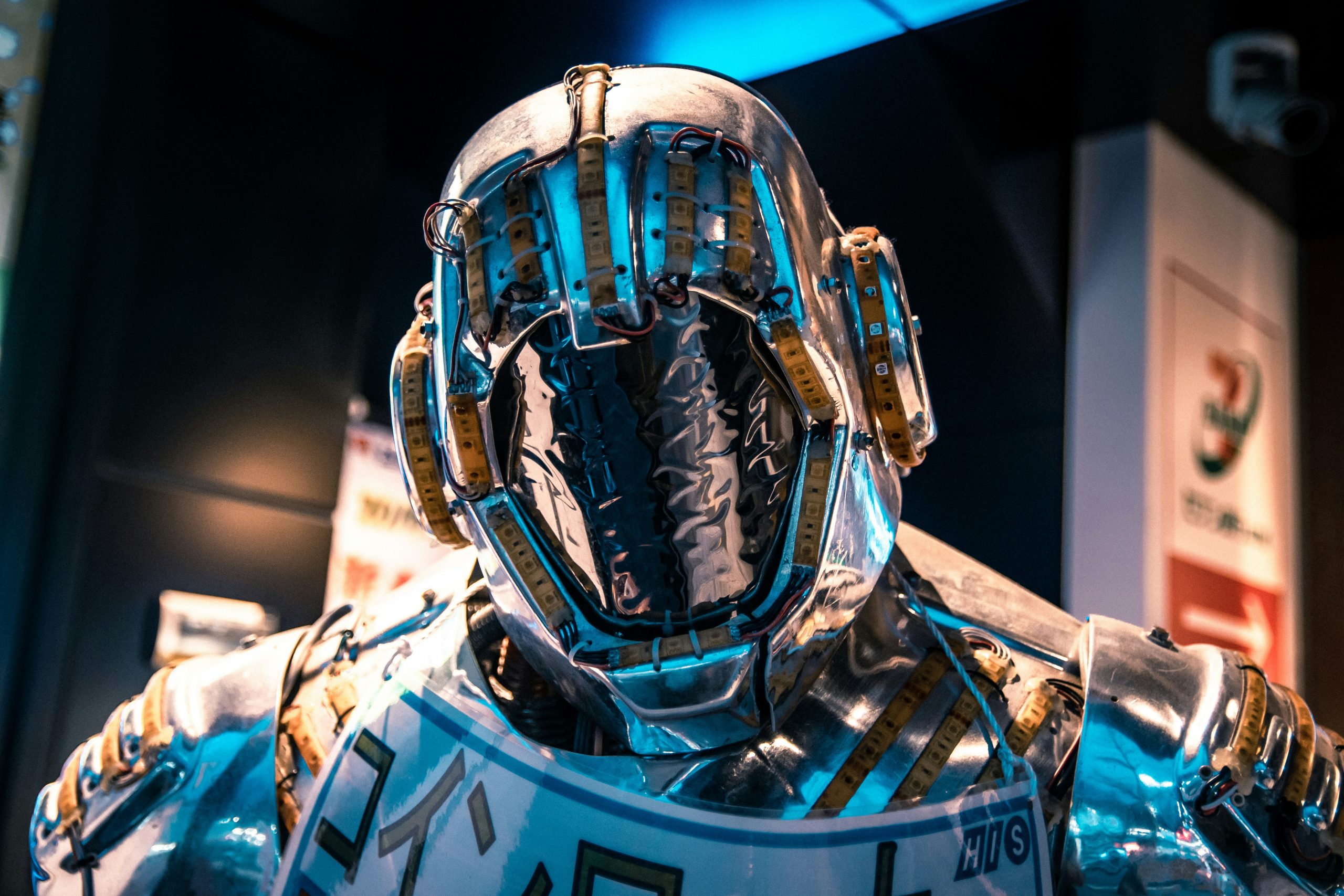 A robot. Photo by Maximalfocus on Unsplash. https://unsplash.com/photos/blue-and-black-helmet-on-blue-and-white-textile-0n4jhVGS4zs