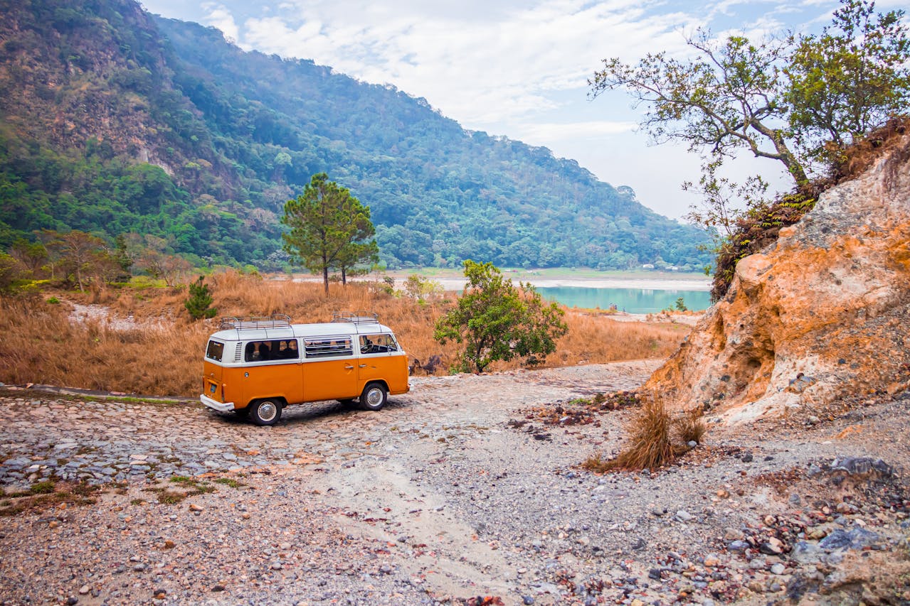 traveling imporve your mental health: Photo by Alfonso Escalante: https://www.pexels.com/photo/photo-of-volkswagen-kombi-on-unpaved-road-2533090/