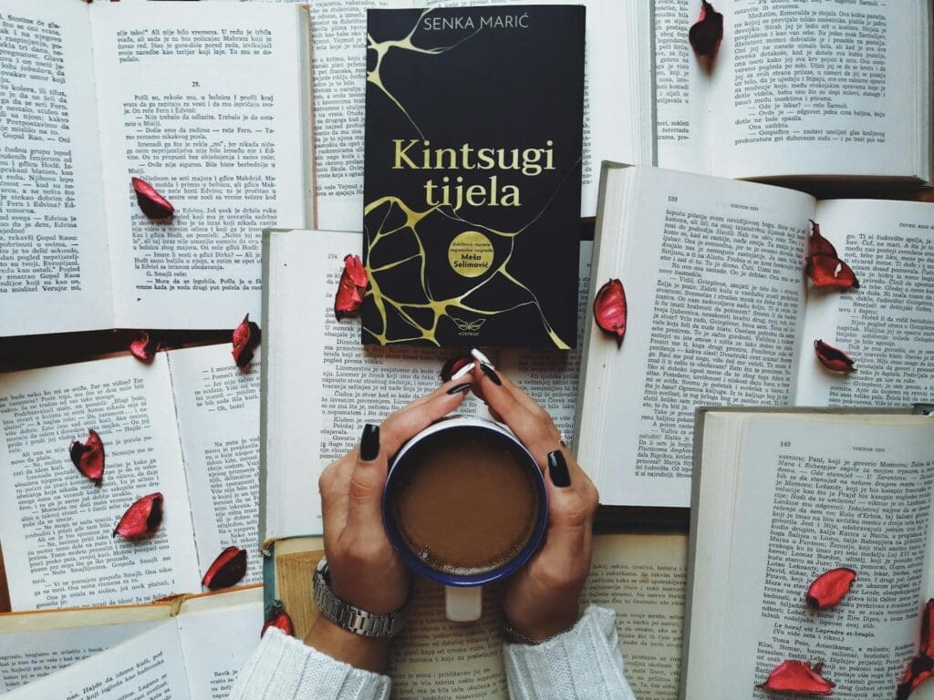 Photo by Ena Marinkovic: https://www.pexels.com/photo/black-and-gold-unk-book-3698598/