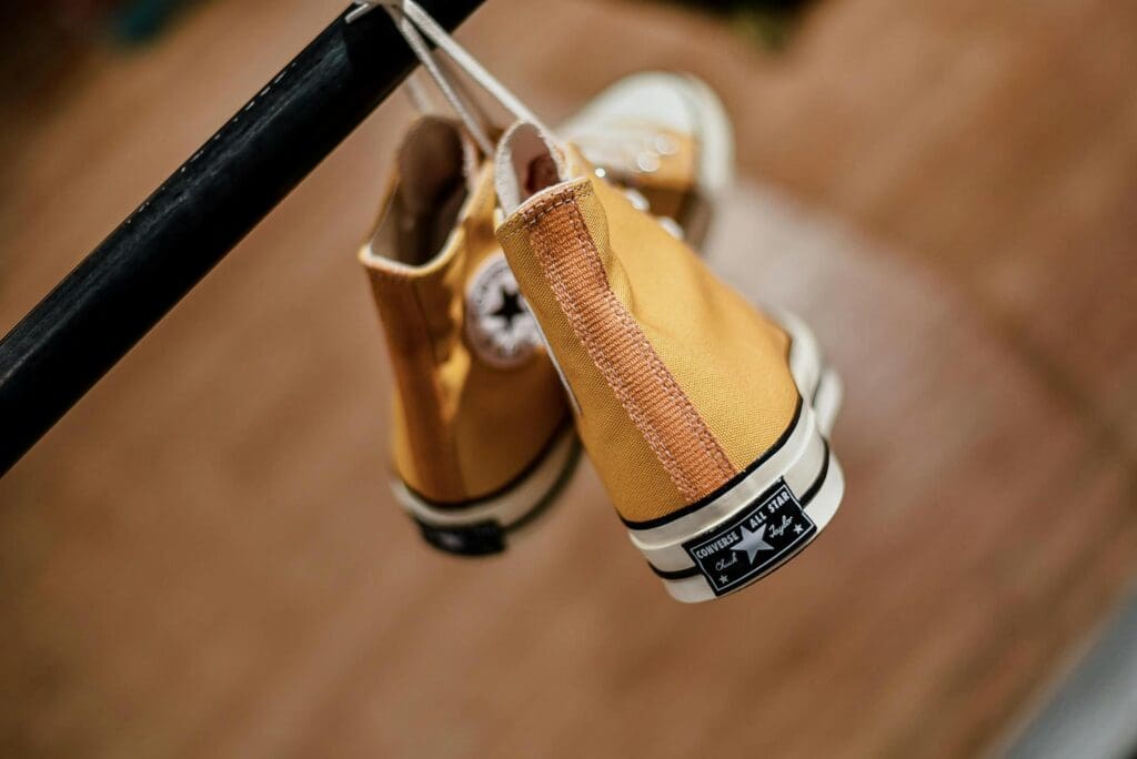Photo by Wayne Lee: https://www.pexels.com/photo/yellow-and-white-converse-all-star-sneakers-12651114/