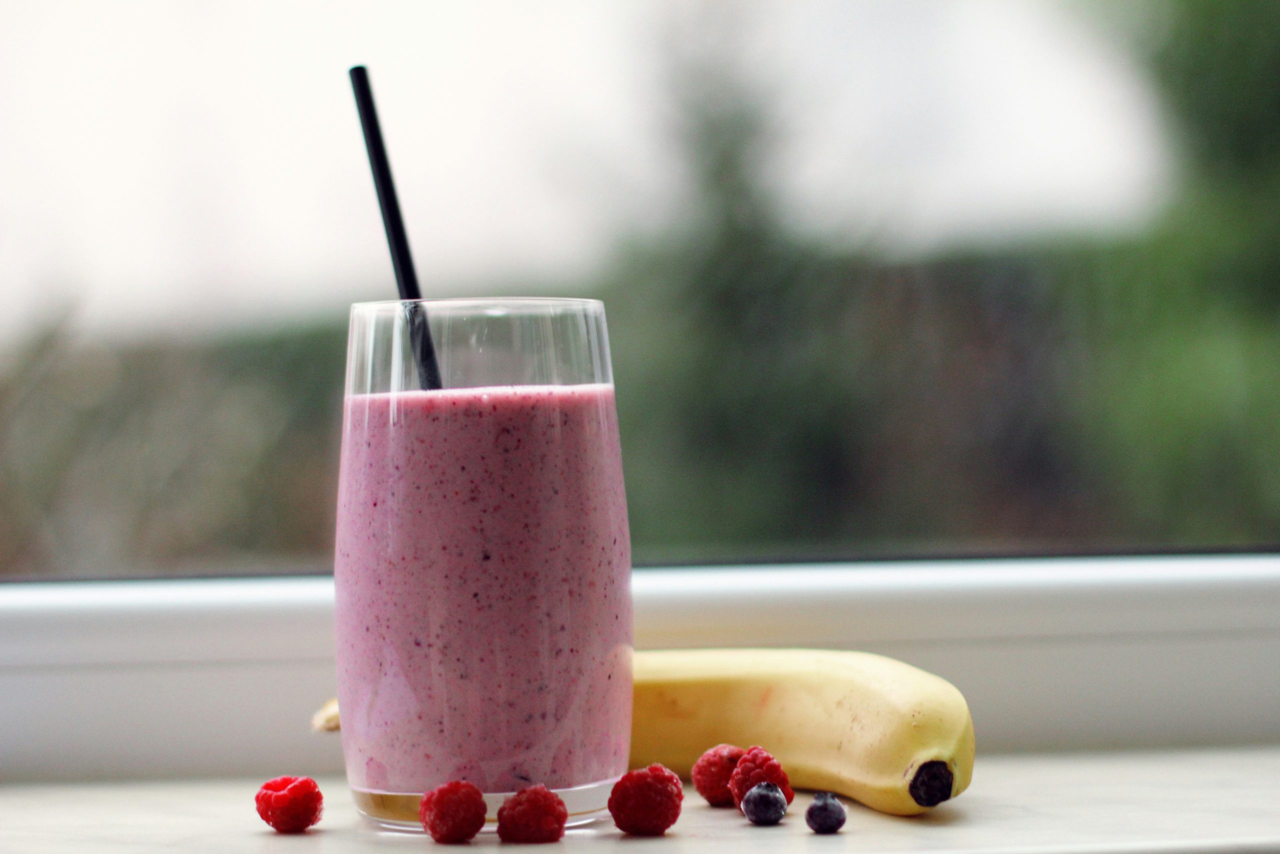 Breakfast smoothie with berries and banana