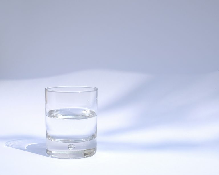 too much water: glass of clear water
