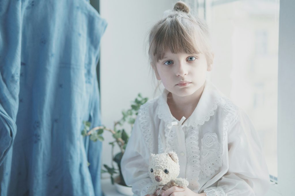 Little girl. Photo by Vitolda Klein on Unsplash. https://unsplash.com/photos/girl-in-white-dress-holding-white-bear-plush-toy-qmtTxHSCKmI