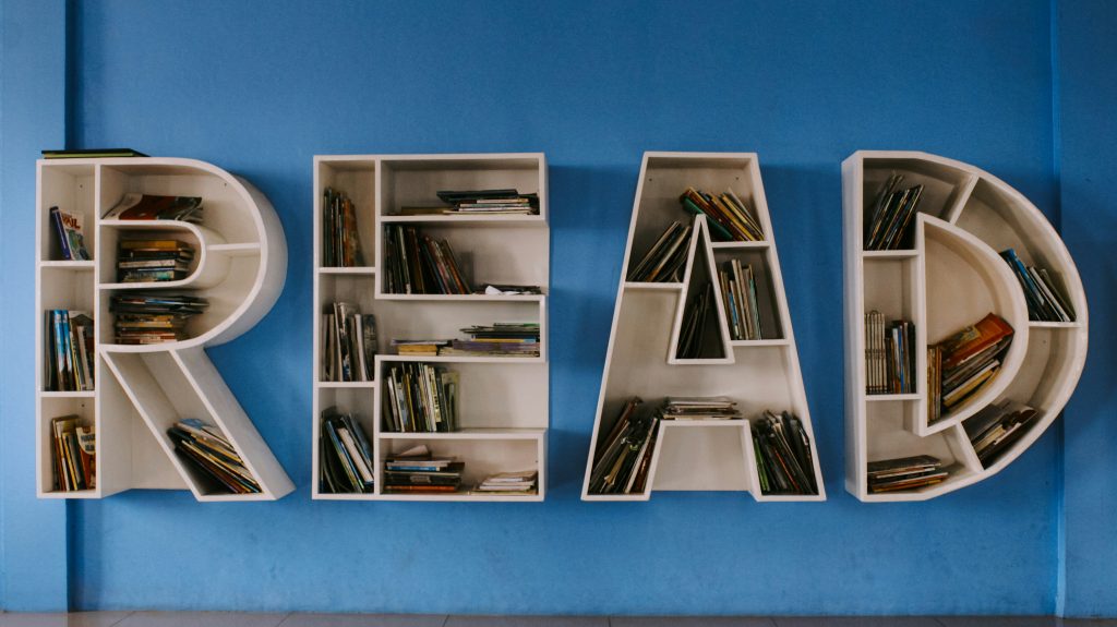 Bookshelves. Photo by Ishaq Robin on Unsplash. https://unsplash.com/photos/the-letters-read-read-are-made-out-of-bookshelves-caND1D-Kh9Y