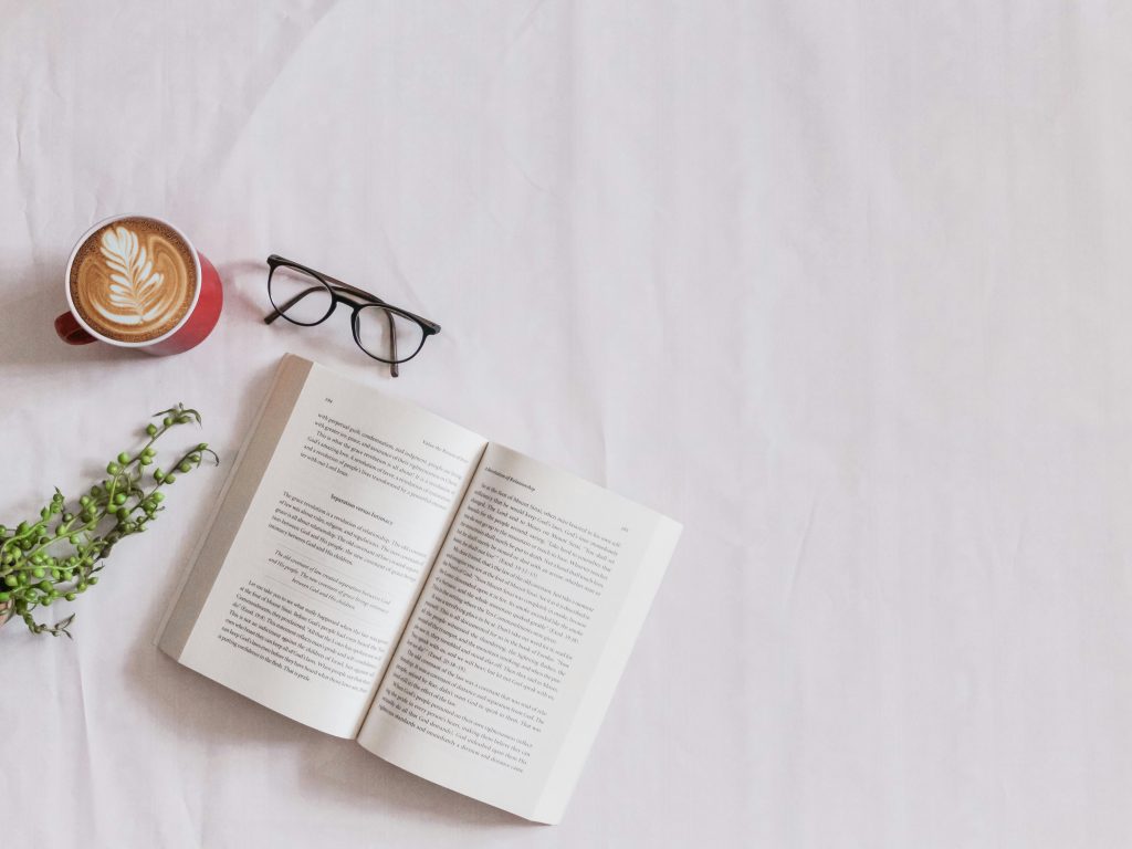 Coffee, glasses, and a book. Photo by Sincerely Media on Unsplash. https://unsplash.com/photos/book-page-beside-eyeglasses-and-coffee-_-hjiem5TqI