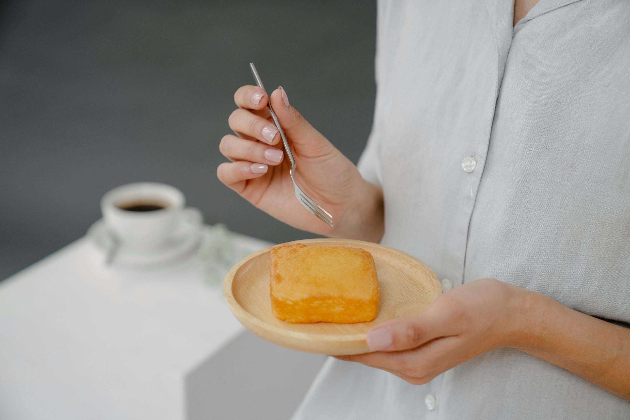Woman hand holding a sponge cake