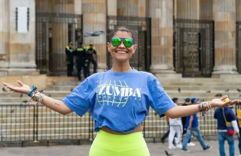 woman in blue zumba shirt