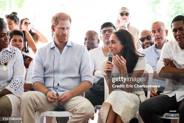 Prince Harry and Megan Markle on an organization fundraising meeting