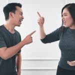 Couple disagreeing because of a behaviors