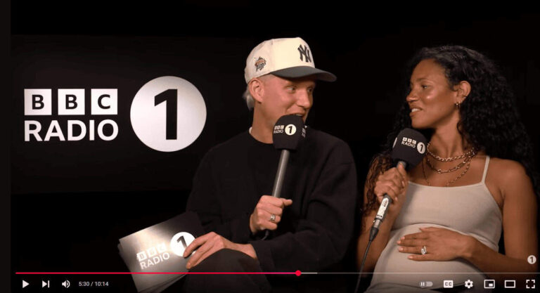 Vick Hope, wife of Calvin Harris showing baby bump during BBC Radio 1 interview.