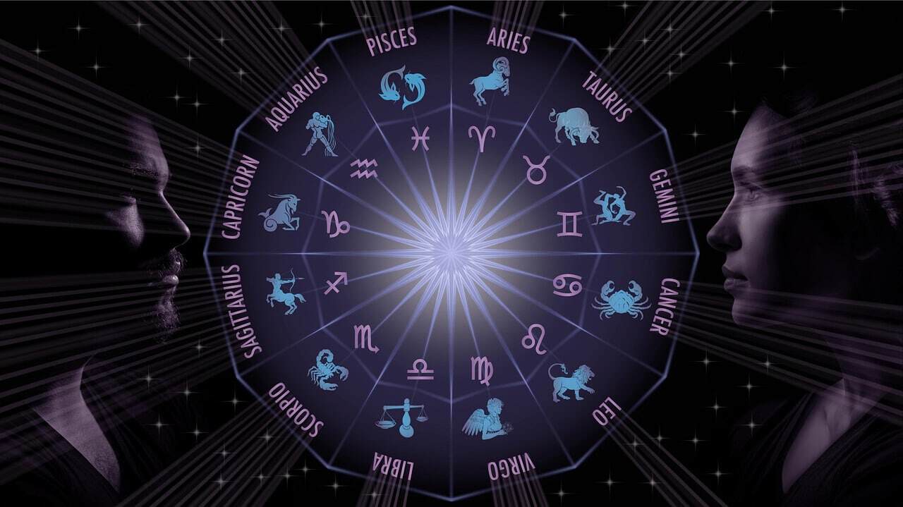 man and woman sun sign zodiac wheel