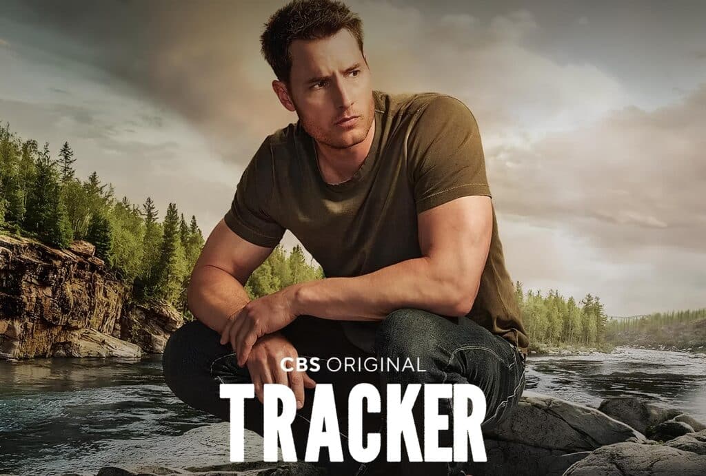 A screenshotted promotional image for the CBS and paramount plus tv show Tracker with main actor Justin Hartley crouched down