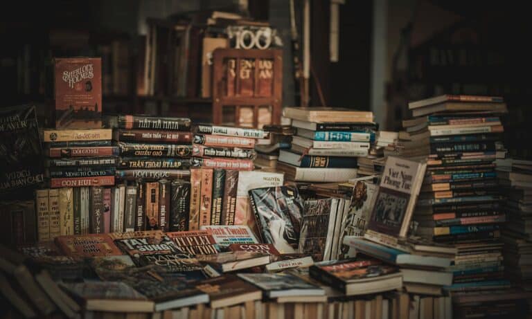 A cozy indoor bookstore with stacked bookshelves filled with novels and literature. 10 Best Literary Festivals