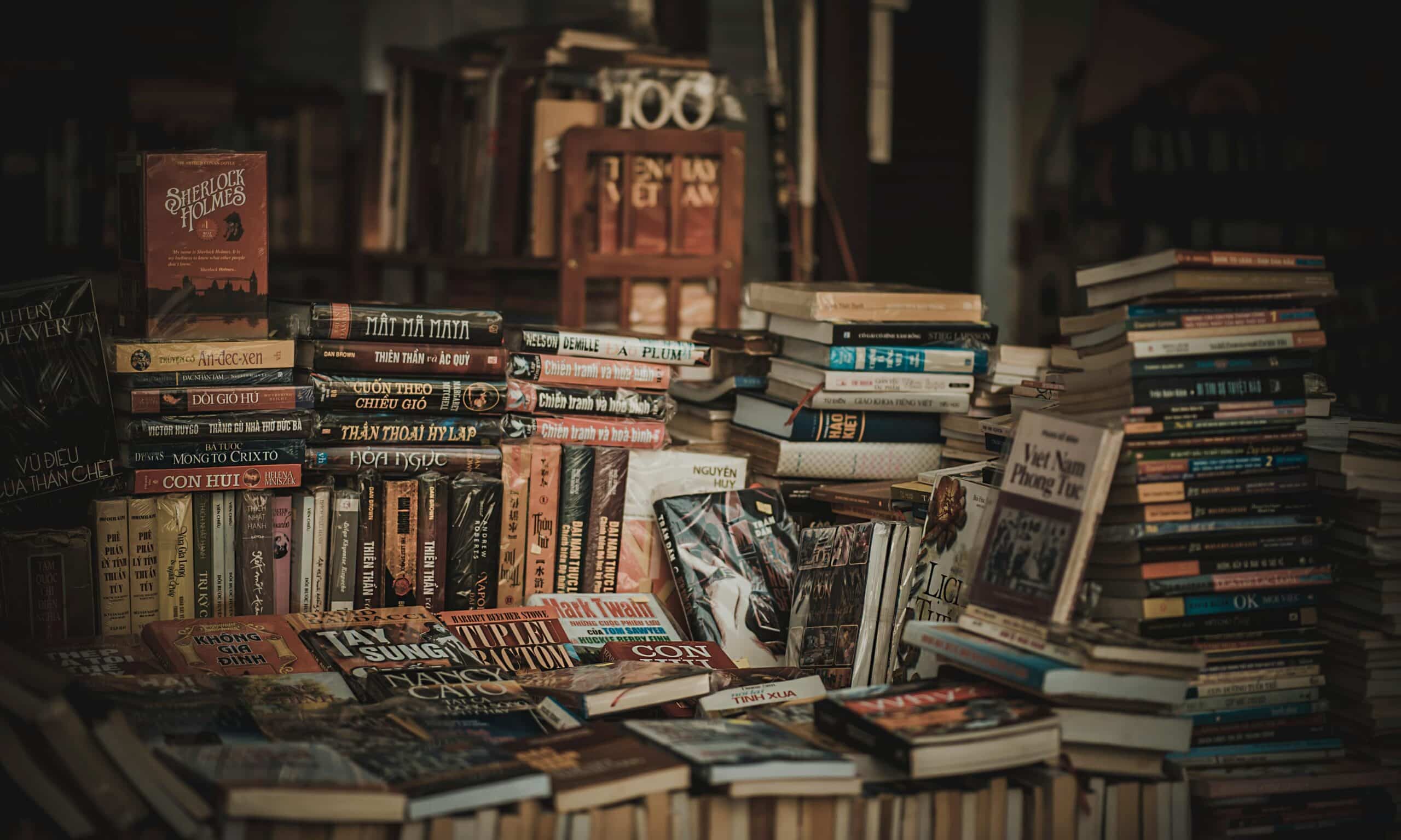 A cozy indoor bookstore with stacked bookshelves filled with novels and literature. 10 Best Literary Festivals