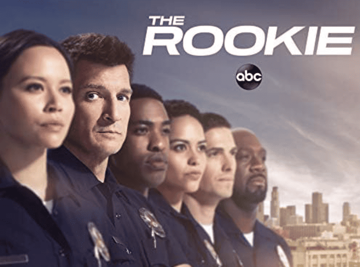 The main cast of The Rookie, including Nathan Fillion, in their police uniforms.
