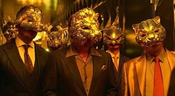 The VIPs from Squid Game wearing golden masks resemble Elon Musk.