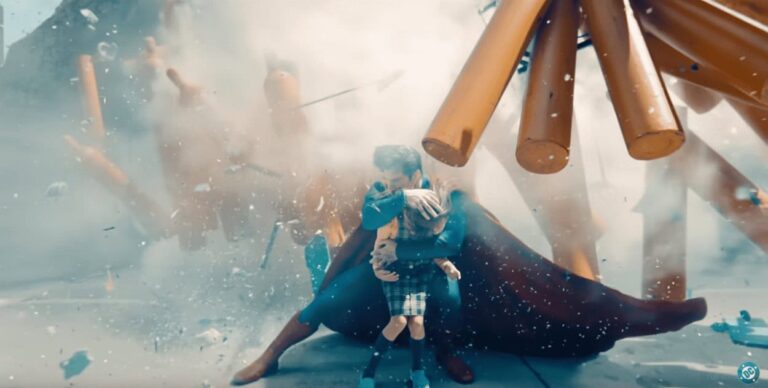 Superman protects a little girl