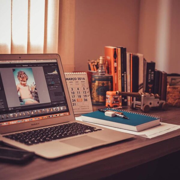 Modern home office workspace with a laptop, notebook, and desk setup—ideal for freelance work, remote jobs, and a productive work from home routine. Image credit: by Pexels via Pixabay