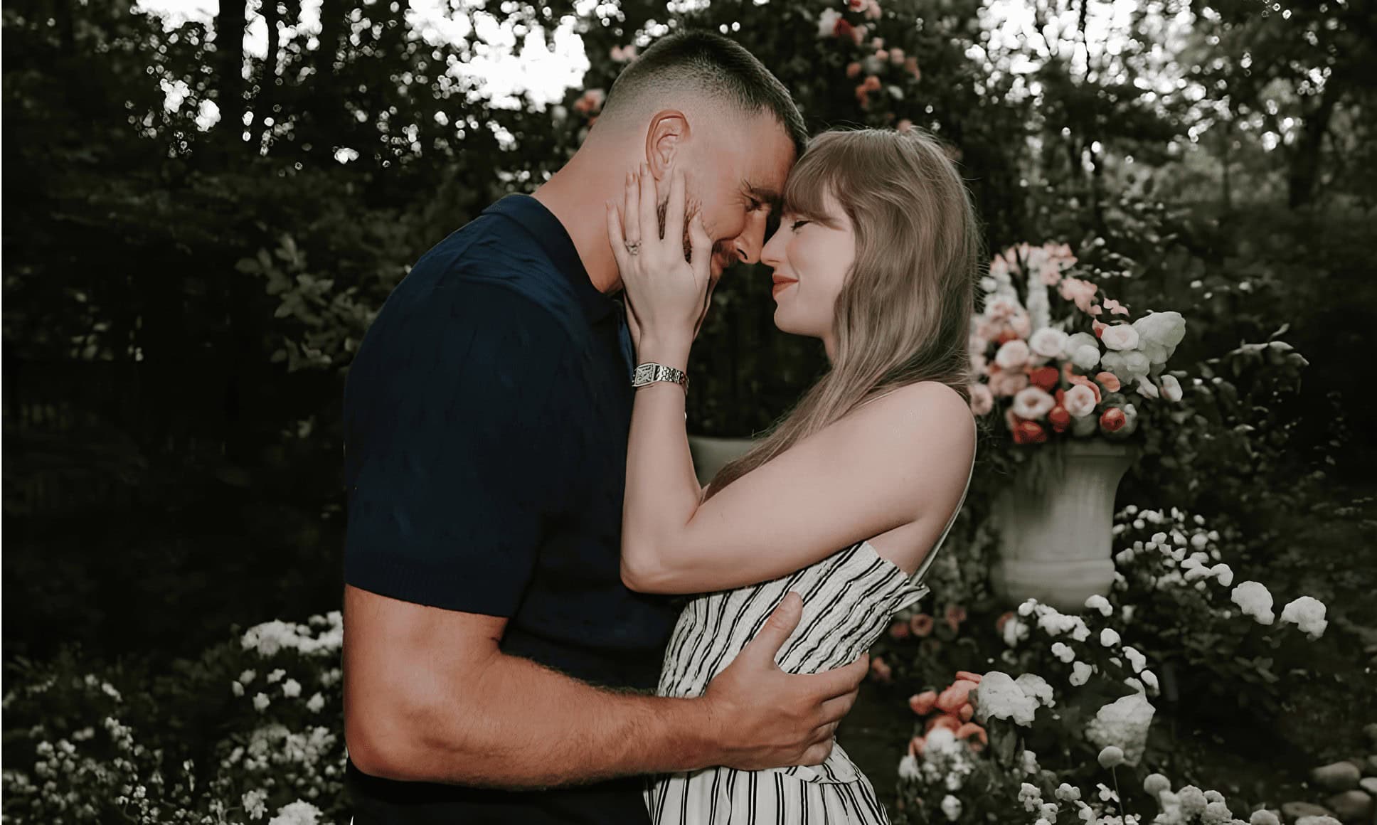 Taylor Swift and Travis Kelce engagement photo. Engagement nails.