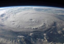 A stunning aerial view of Earth with a massive swirling hurricane, highlighting meteorological beauty. Hurricane-proofing