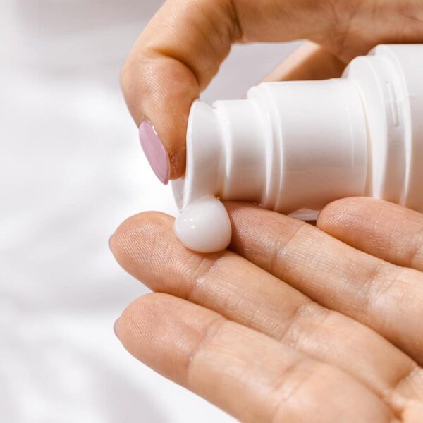 This is an image of hands getting ready to apply moisturizer. Choices for moisturizing night creams are plentiful.