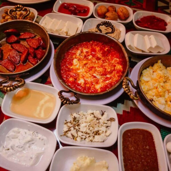 Bowls filled with different foods on a table. Global flavor