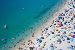 Beach filled with people, beach bacteria