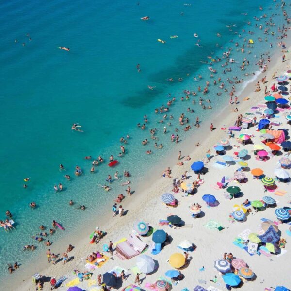 Beach filled with people, beach bacteria