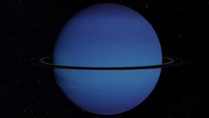 A detailed image of Uranus with its rings captured against a starry background.