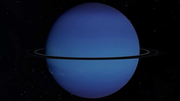 A detailed image of Uranus with its rings captured against a starry background.