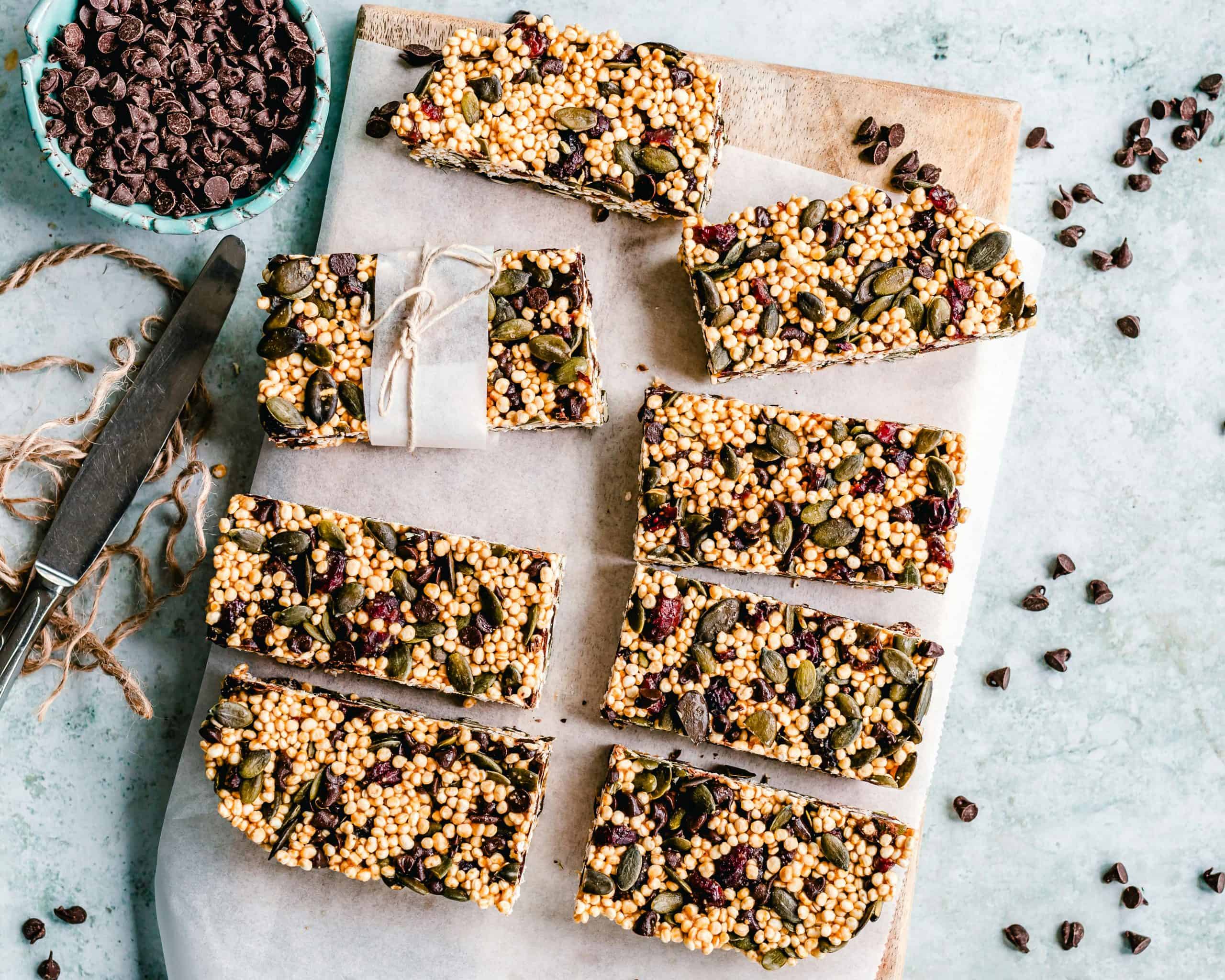 Top view of homemade protein bars with seeds and chocolate chips. Image credit: by Ella Olsson via Pexels