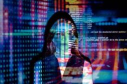 A woman with digital code projections on her face, representing technology and future concepts. home depot. developer/Oracle