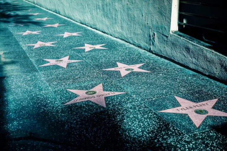 View of Hollywood Walk of Fame with stars on the sidewalk in Los Angeles, California.