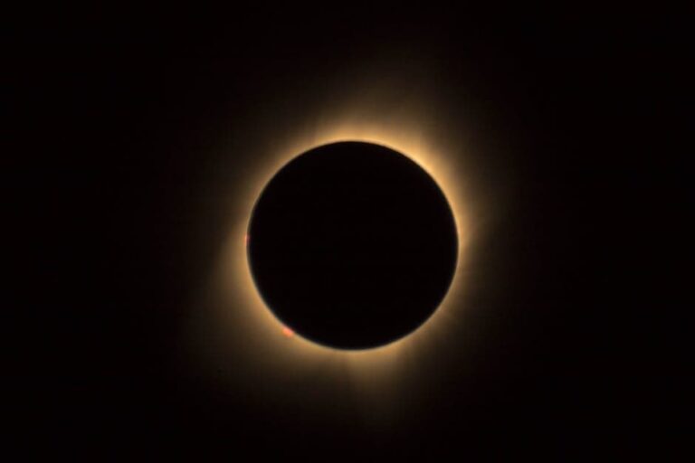 A captivating view of a solar eclipse highlighting the glowing corona in a dark sky.
