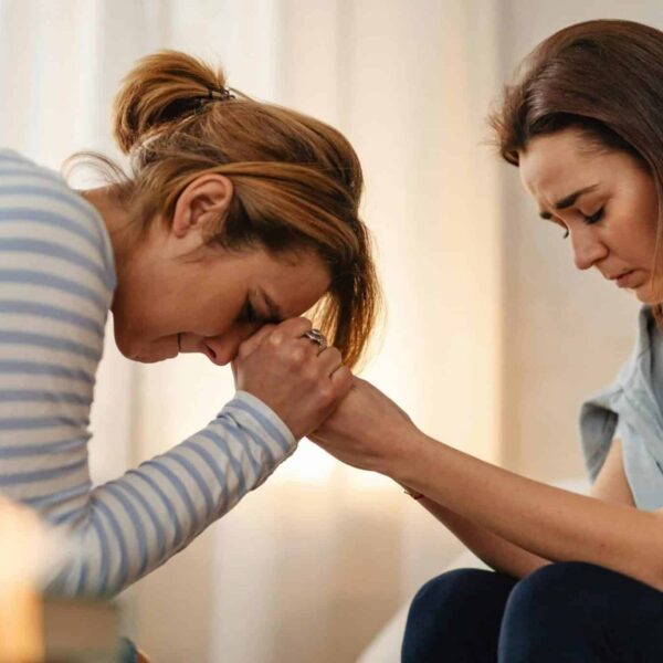 Mother and daughter sharing a heartfelt moment, supporting each other through emotional times. Lyme disease