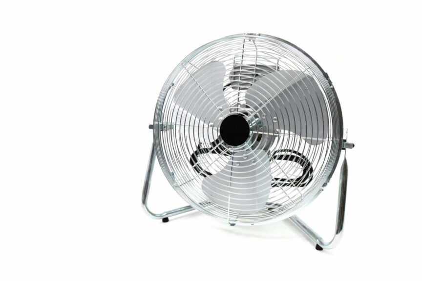 Sleek stainless steel industrial fan with metal blades, similar in design to attic fan motors, isolated on a white background.