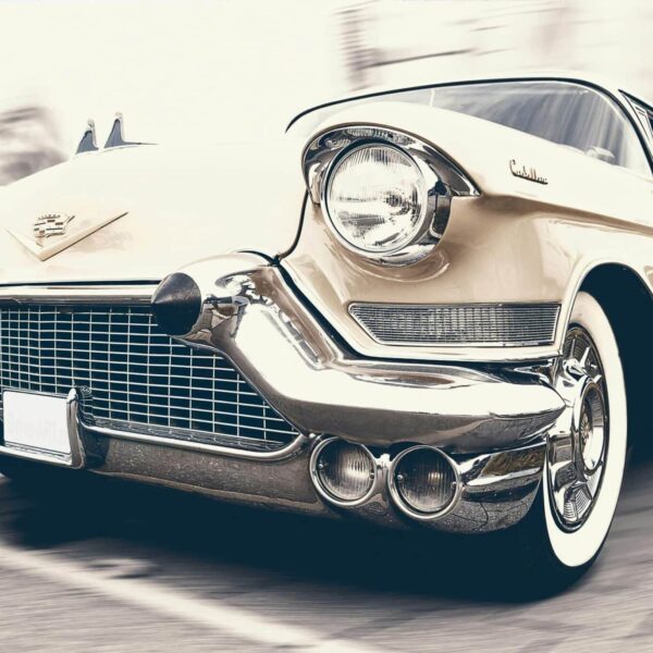 A classic Cadillac captured in motion, showcasing its vintage charm and sleek design. Cadillac El Dorado