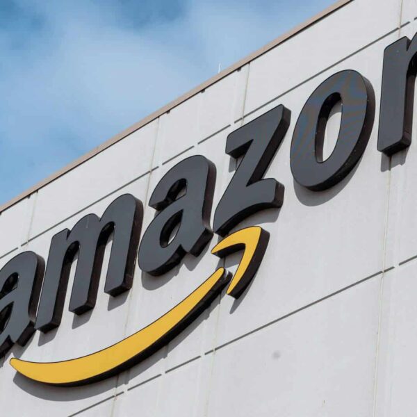 The Amazon logo is displayed on a building. Amazon Prime, Prime Days, Fall Fashion Deals